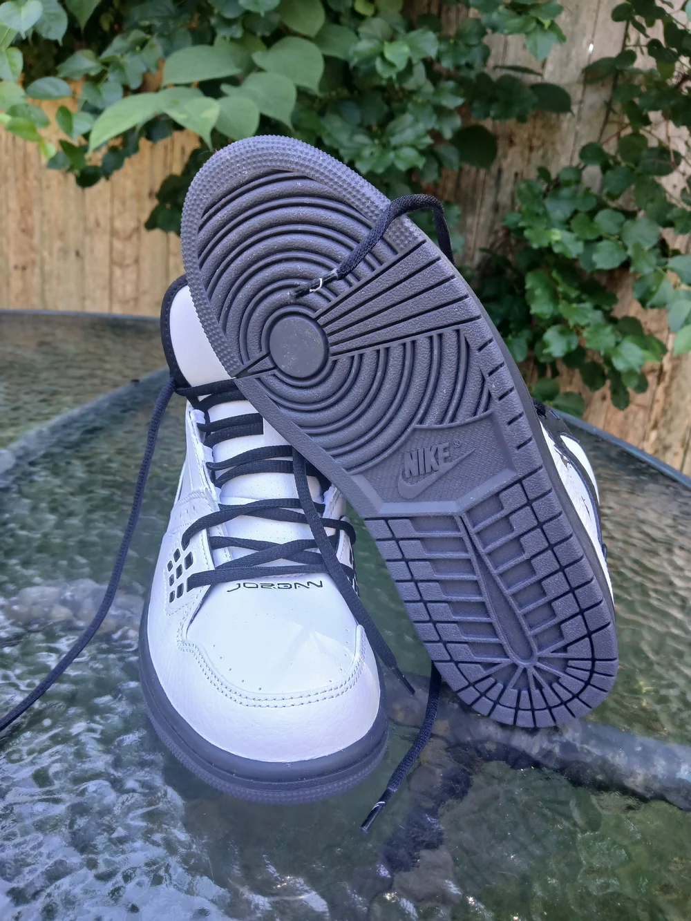 Jordan Men’s White and Black Mid-Top Sneakers with Jumpman Logo